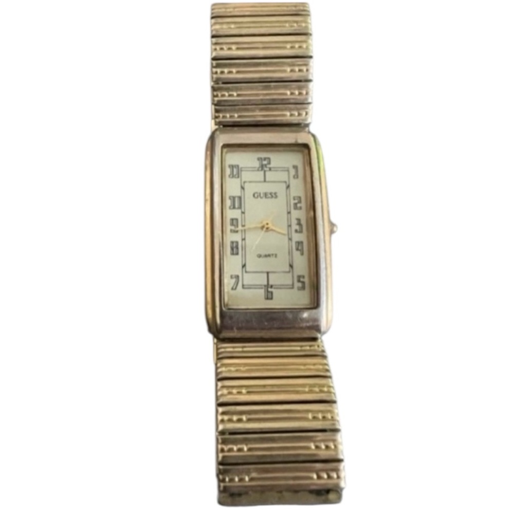 Vintage Guess women’s gold and silver tone analog expansion band wristwatch